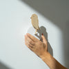 Birdie Pro accessories by Birdie, wooden product with intricate craftsmanship, showcasing natural wood grain and detailed design.