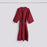 Burgundy waffle bathrobe by Hay, cozy and textured accessories made from soft fabric, displayed hanging against a neutral background.