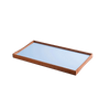 Black and blue small turning tray by Finn Juhl for Architectmade, stylish accessory with a sleek design, perfect for organizing small items.