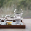 Set of two Spring accessories by Architectmade, featuring minimalist, handcrafted decorative pieces in natural wood finishes.