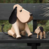 Wooden toy for kids featuring Oscar & Rufus characters by Architectmade, crafted from natural wood with colorful painted details.