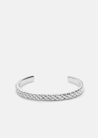 Silver plated Scale Cuff bracelet by Skultuna, featuring a textured, layered design on a sleek silver accessory.