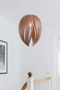 Red and white Gladys pendant light by Atelier Cocotte featuring a large birch-shaped design, perfect for modern interior lighting.