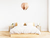 Red birch Gladys pendant light by Atelier Cocotte featuring a white interior and modern lighting design.