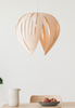 Gladys Pendant lighting by Atelier Cocotte featuring a large red birch and white design, hanging as a stylish ceiling light.