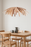White Tina pendant light by Atelier Cocotte featuring a minimalist modern design with a smooth, rounded shape and clean finish.