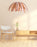 White Tina pendant light by Atelier Cocotte, showcasing a modern lighting fixture with a sleek, minimalist design.