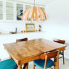 White Tina pendant light by Atelier Cocotte featuring a sleek, modern design perfect for contemporary lighting decor.