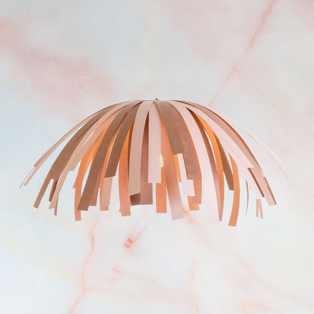 White Tina Pendant lighting by Atelier Cocotte featuring a sleek, modern design with a short hair-style shade.