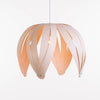 Ti-Fleur pendant by Atelier Cocotte, white walnut lighting fixture with floral-inspired design, hanging as a stylish ceiling light.