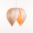 White birch Noisette #1 pendant light by Atelier Cocotte, showcasing a sleek, modern lighting fixture with a smooth, rounded design.