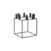 Black Kubus accessory by Audo Copenhagen, featuring sleek geometric design and modern aesthetic in the image.