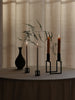 Black Kubus accessory by Audo Copenhagen, modern geometric design, displayed on a neutral background.