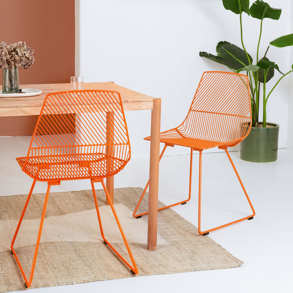 Black Ethel Chair by Bend Goods, stylish seating with a modern design, made in the USA, featuring a sleek metal frame.