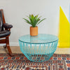 White Bend Goods Drum Table, made in the USA, with a sleek cylindrical design, perfect for modern living spaces.