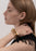 Gold plated Relier Petit bracelet by Skultuna, delicate accessories with a sleek design, displayed on a neutral background.