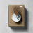 Close-up of Birdie Pro accessories packaging featuring the Birdie logo and walnut design on a sleek, modern background.