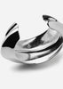 Silver-plated Écume De Mer bangle by Skultuna, showcasing a sleek, rounded design with a polished finish, perfect as a stylish accessory.