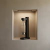Stelton Brus metallic black carbonator accessory, sleek black metal design for sparkling water carbonation.