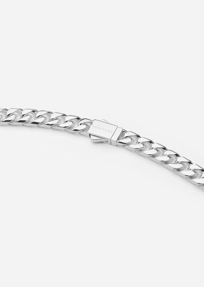 Silver plated Petit Paul chain bracelet by Skultuna with delicate link design, styled as a stylish accessory.
