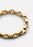 Gold plated Velo Chain bracelet by Skultuna, showcasing a stylish accessory with intricate chain links on a neutral background.