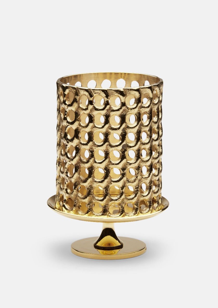 Elegant Skultuna lantern accessory with a sleek design, featuring a metal frame and glass panels for ambient lighting.