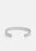 Silver plated ribbed cuff bracelet by Skultuna, showcasing textured design and polished finish on a neutral background.