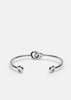 Silver plated Together Petit Cuff bracelet by Skultuna, featuring a sleek, minimalist design in a close-up image.