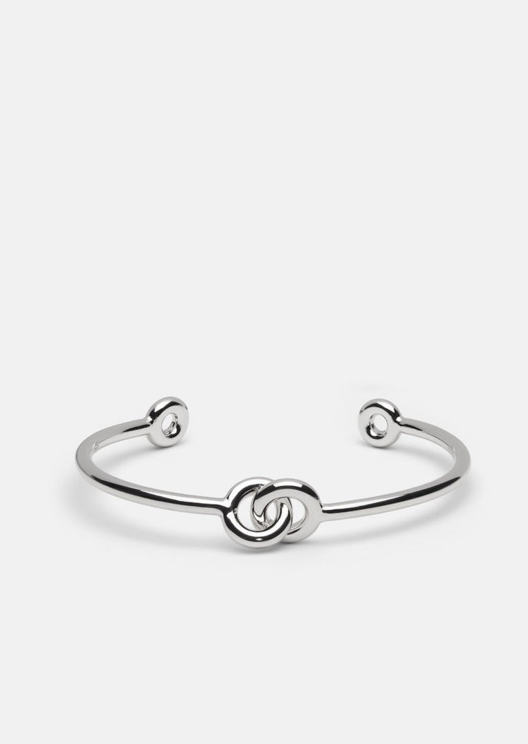 Silver plated Together Petit Cuff bracelet by Skultuna, showcasing a sleek, minimalist design with a smooth, polished finish.