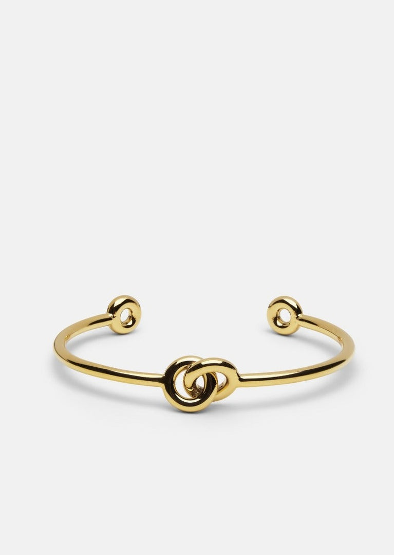 Gold plated Together Petit Cuff by Skultuna, elegant minimalist accessory with sleek design and smooth finish.