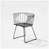 Black Captain Chair by Bend Goods, stylish modern seating with a sleek design and curved metal frame.