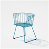 Modern Captain Chair by Bend Goods featuring sleek metal frame and comfortable seating in a stylish design.