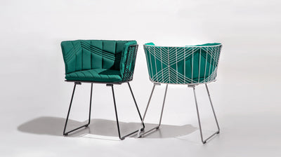 Bend Goods Captain Wire Chair in black with a curved metal frame and woven wire seat, modern seating for indoor or outdoor use.