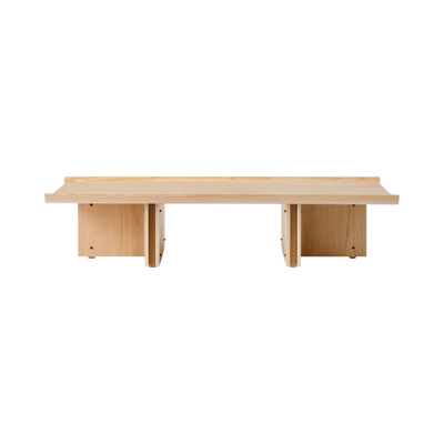 Conrad lounge table by Audo Copenhagen, natural oak finish, showcasing a sleek, modern design with a smooth tabletop and sturdy legs.