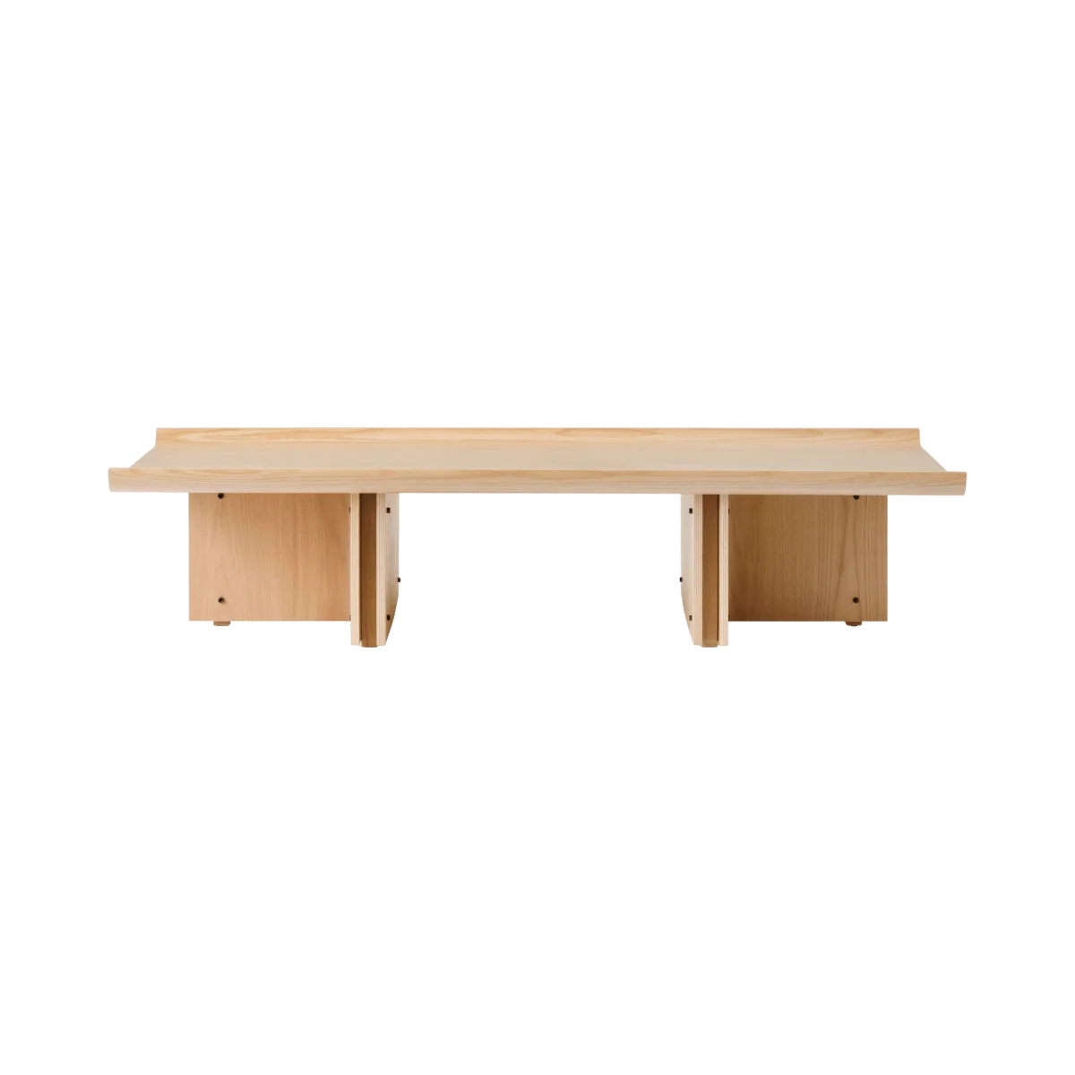 Conrad lounge table by Audo Copenhagen with natural oak finish, showcasing a sleek modern design and smooth surface.