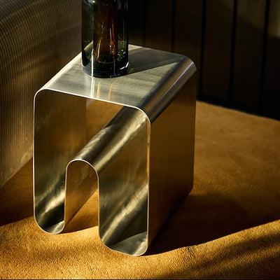 AYTM Curva Solid Stool in silver, modern seating with sleek curved design, perfect for contemporary interior decor.