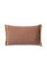 Checker cushion by Lorena Canals in marsala with a geometric checkered pattern