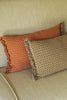 Checker Cushion by Lorena Canals in terracotta with a classic checked pattern
