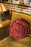 Rose cushion by Lorena Canals in a soft floral design, decorative accessory for sofas and beds