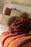 Rose cushion by Lorena Canals in a soft floral design, decorative home accessory.