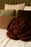 Rose Cushion by Lorena Canals in soft pink with textured fabric and decorative detailing