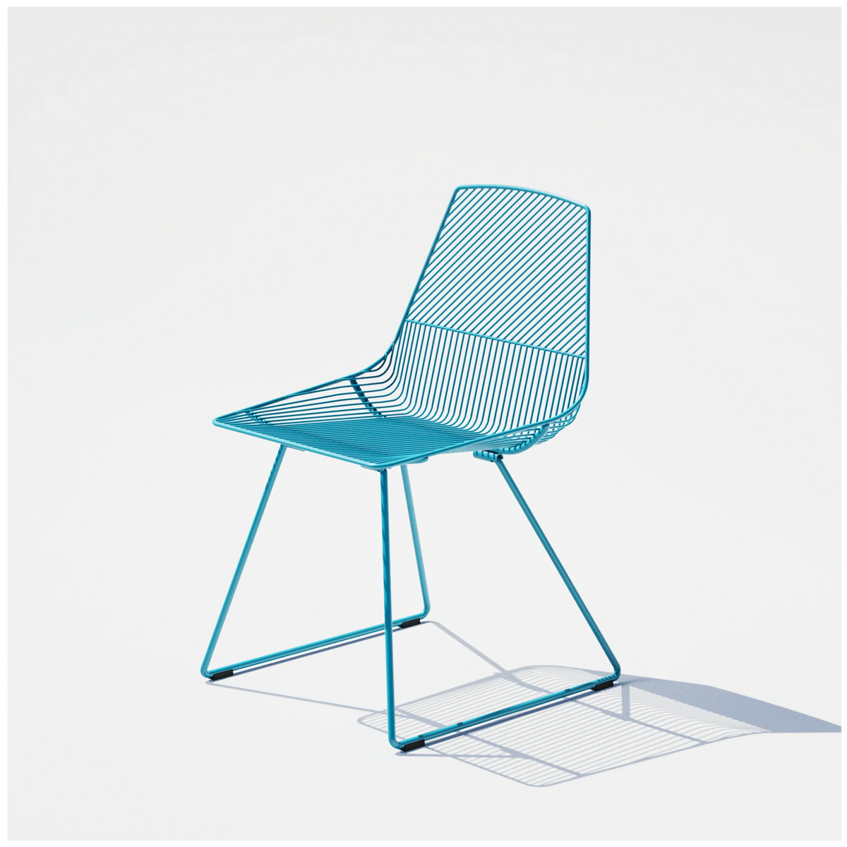 Ethel Chair by Bend Goods, stylish modern seating with a metal frame and woven seat in a contemporary design.