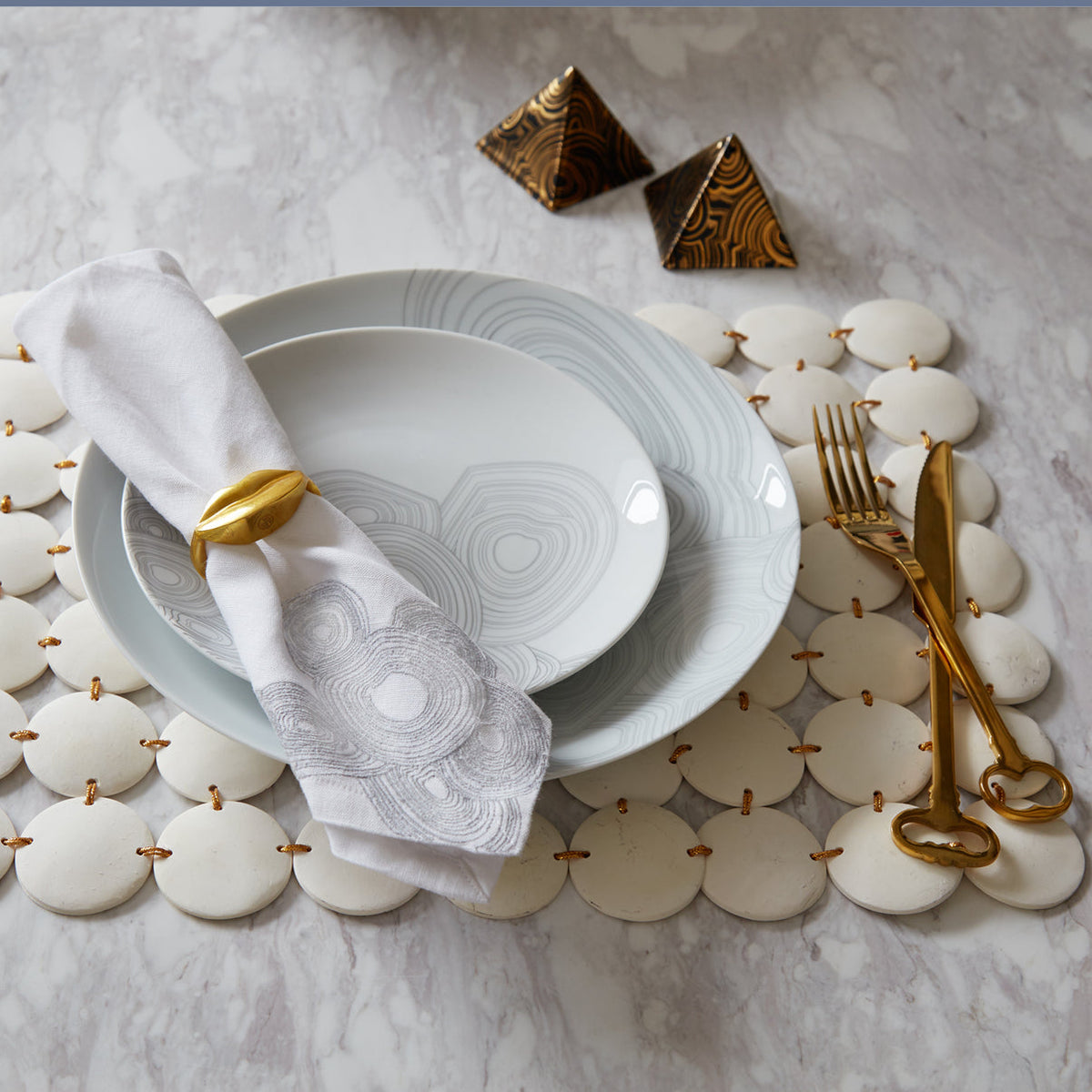 Brass Muse Napkin Rings by Jonathan Adler