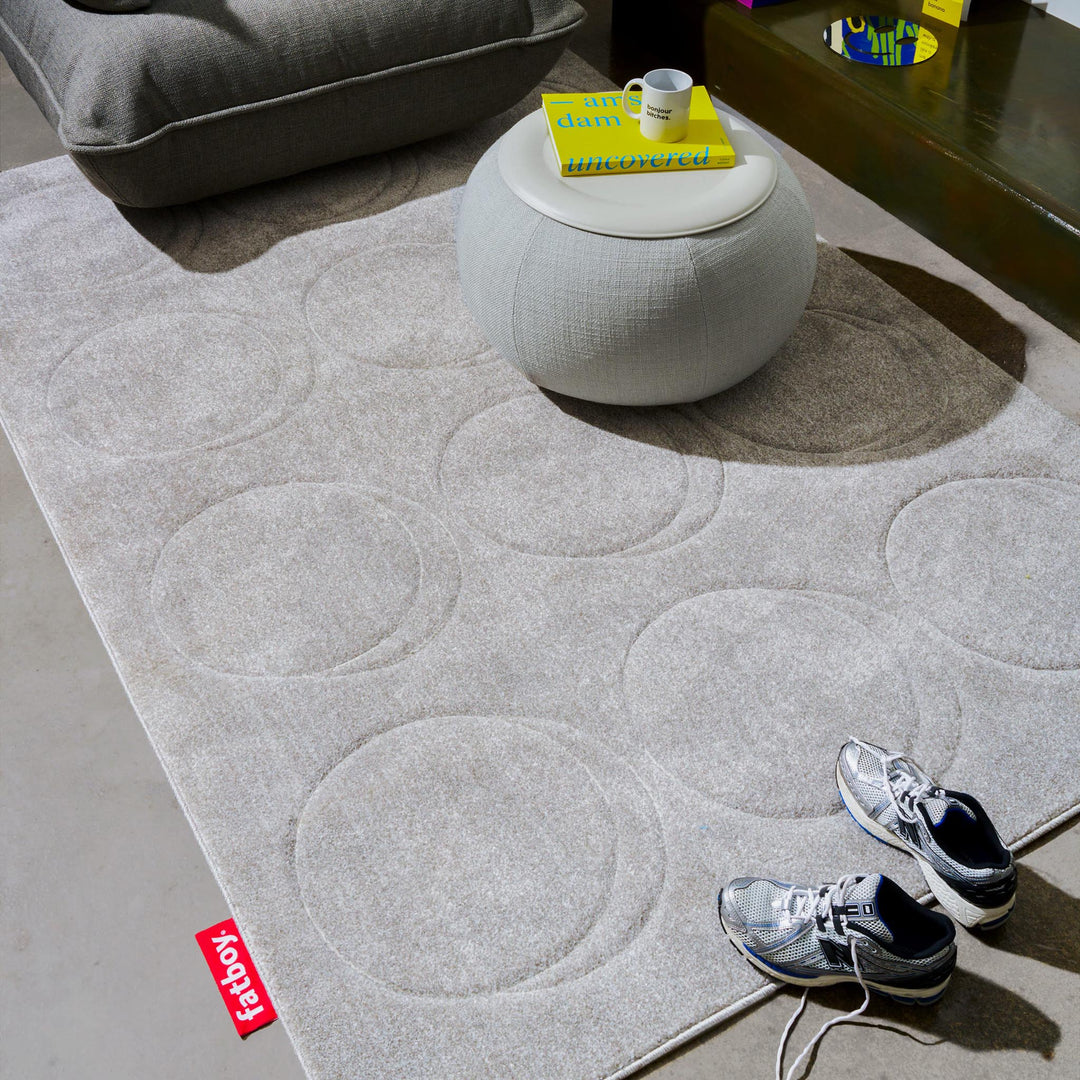 Cloudy grey Dot Carpet by Fatboy, a soft fabric accessory with a playful dotted pattern, designed for modern interior decor.