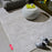 Cloudy grey Dot Carpet by Fatboy, a soft fabric accessory with a playful dotted pattern, designed for modern interior decor.