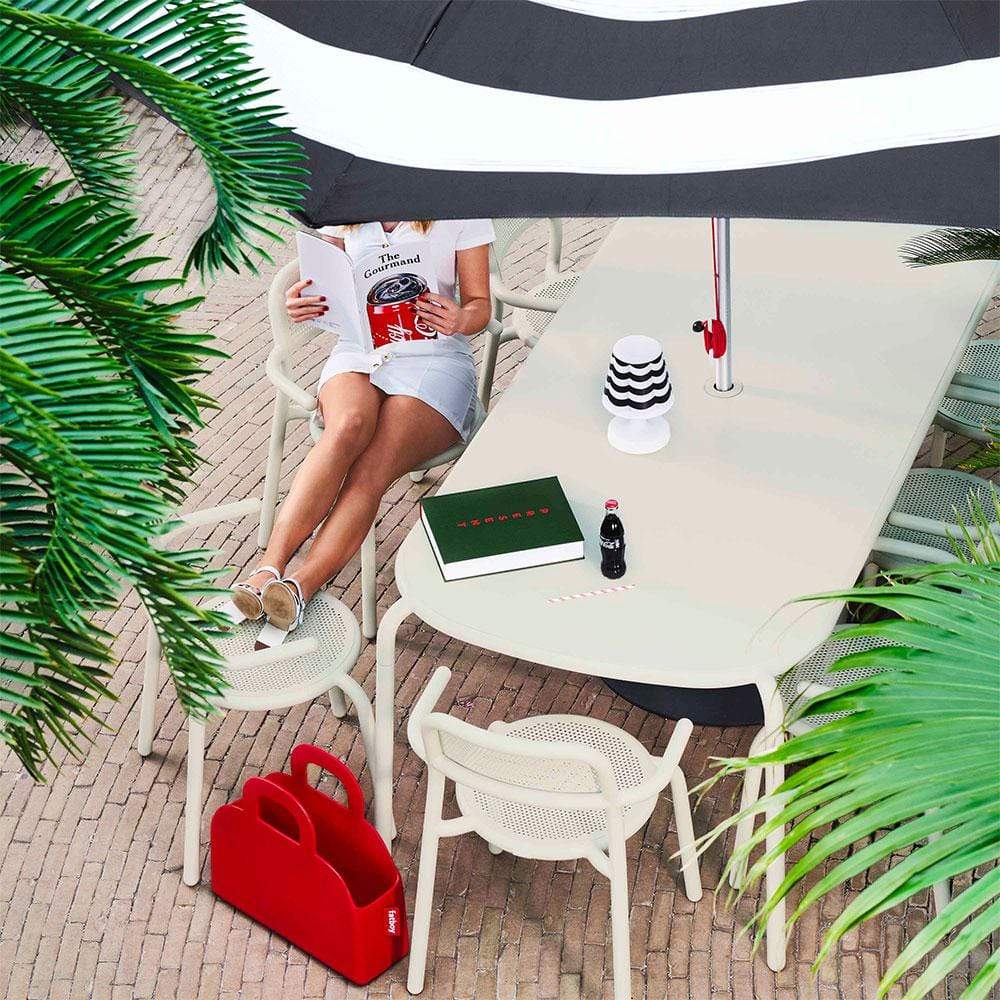 Anthracite Fatboy Toní outdoor armchair with modern seating design, ideal for relaxing in outdoor spaces.