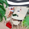 Anthracite Fatboy Toní outdoor armchair with modern seating design, ideal for relaxing in outdoor spaces.