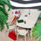 Anthracite Fatboy Toní outdoor armchair with modern seating design, ideal for relaxing in outdoor spaces.