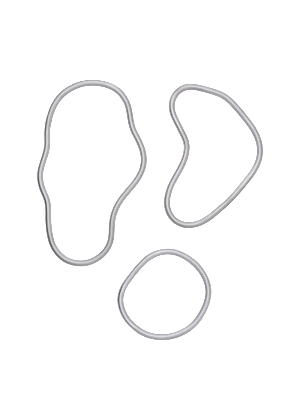 Set of 3 Ferm Living Pond trivets made of aluminum, featuring a modern pond-inspired design for protecting surfaces.