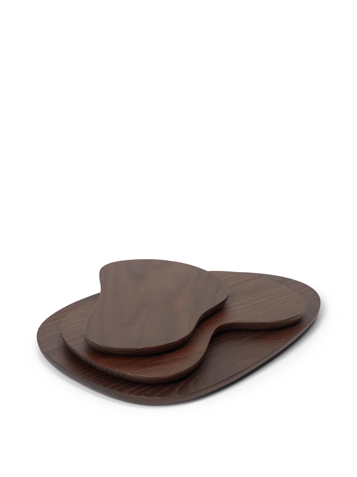 Dark brown Ferm Living Cairn cutting boards, stylish and durable kitchen accessories, made of natural wood.